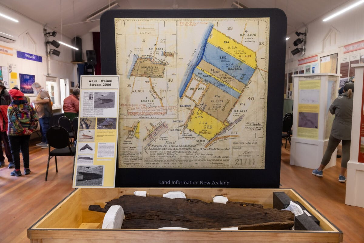 Waka Wainui Stream 2006 land survey map display at Paekākāriki heritage exhibition, showcasing historic land parcels and boundaries in New Zealand.